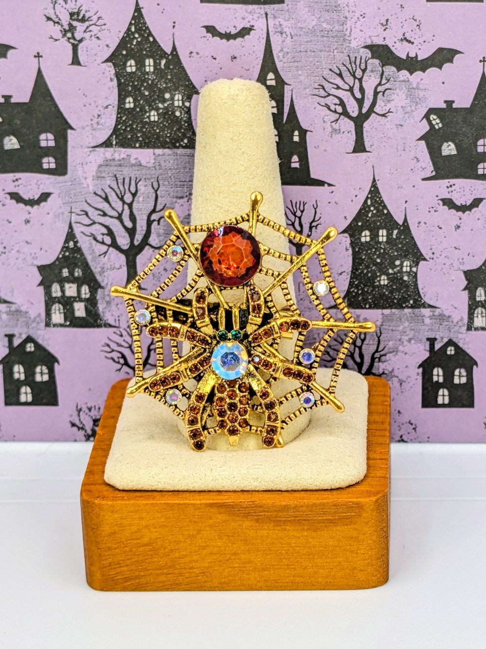 Gold-Tone Spider Web Brooch with Amber and Iridescent Rhinestones